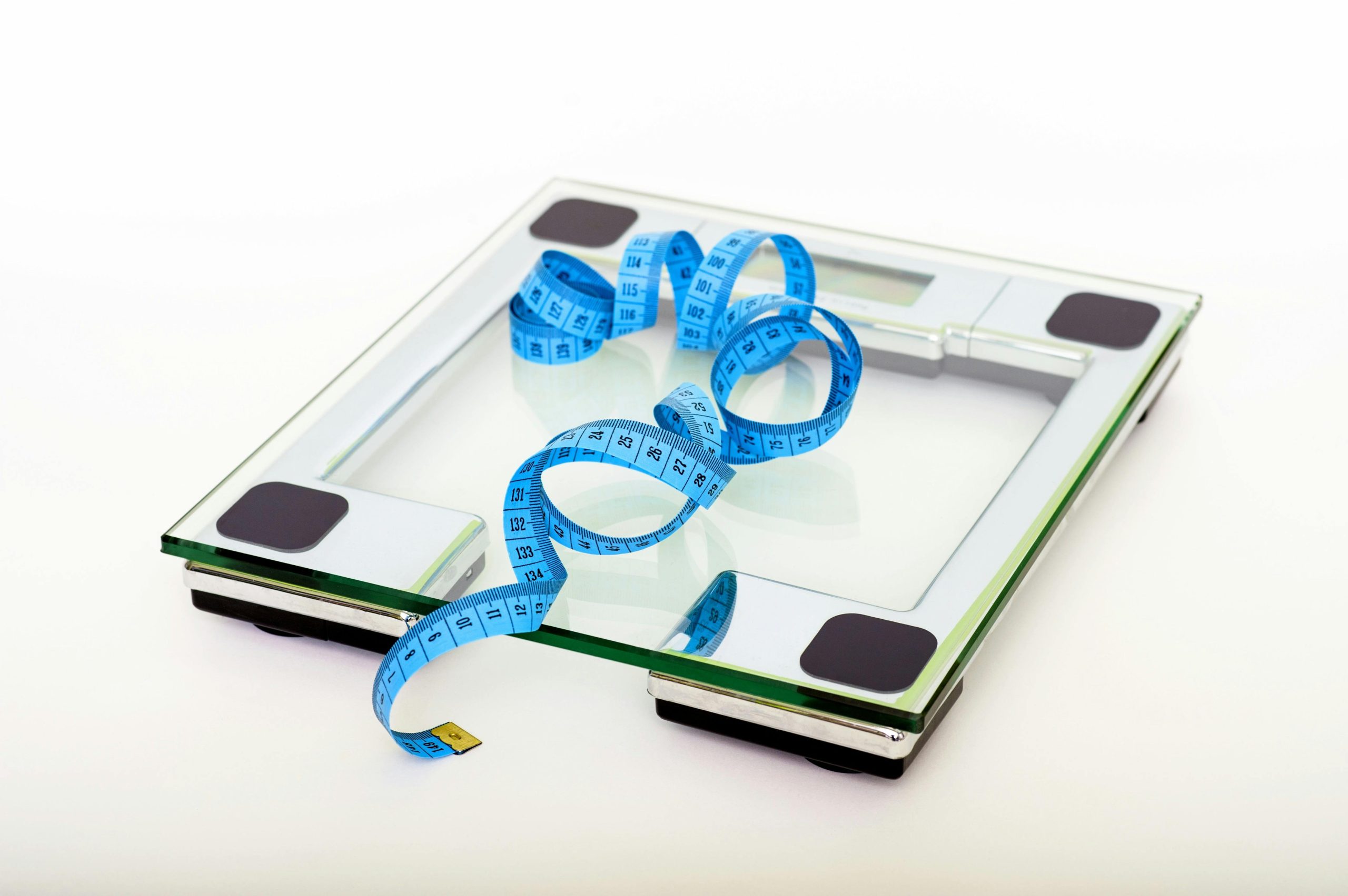Scale with a measuring tape sitting on it